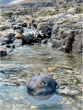 GoSkills hat floating on water
